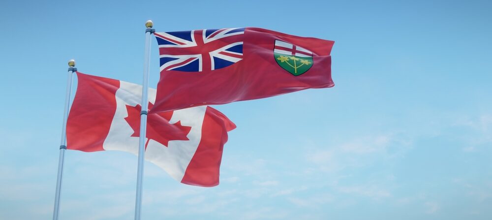 Canadian and Ontario flags wave in harmony