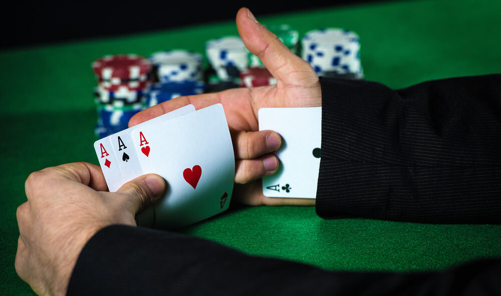 Man cheating at cards