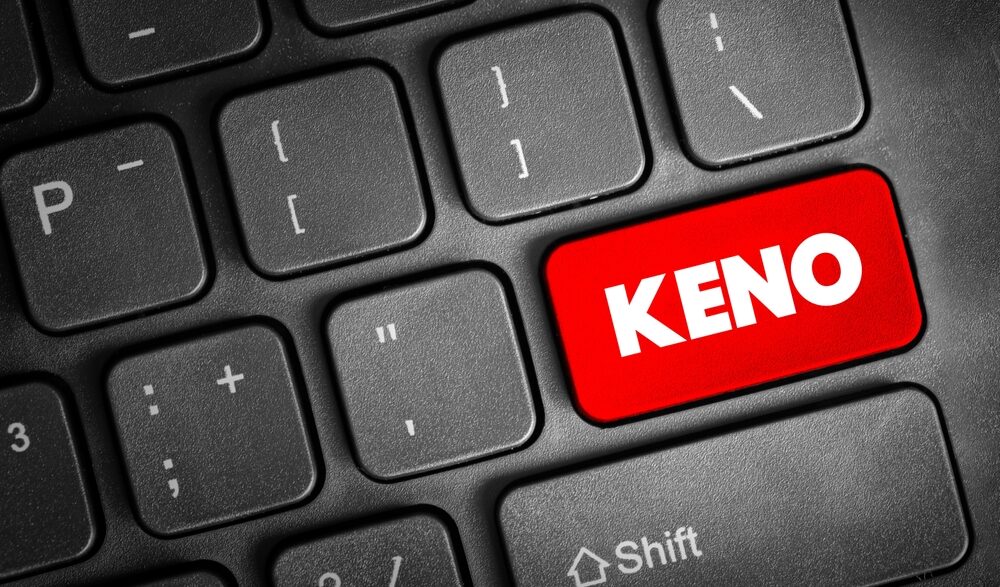 A red Keno button on a keyboard